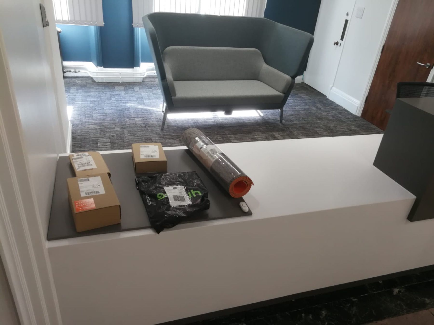 Upholstery material samples and parcels delivered inside a residential building