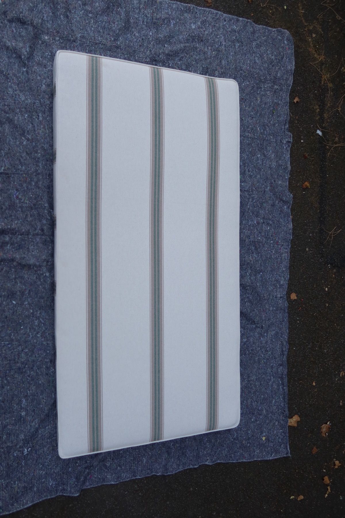 Custom striped seat cushion made by Kennington Upholstery in London