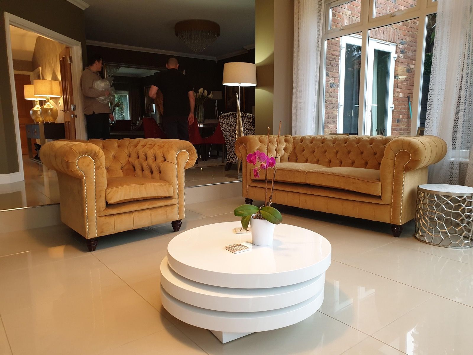 Classic Chesterfield sofa with deep buttoning